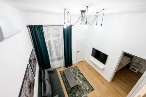 Televízia a/alebo spoločenská miestnosť v ubytovaní Native Apartments Paulińska 20 Superior
