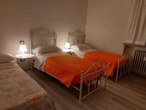 Кровать или кровати в номере ROOM DEL PARCO