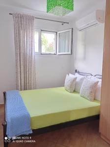Postel nebo postele na pokoji v ubytování Marina's House