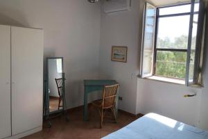 Postel nebo postele na pokoji v ubytování Settebello Village