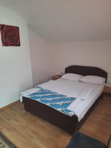 Postel nebo postele na pokoji v ubytování Motel Tetrijeb Sipovo