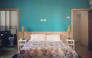 Postel nebo postele na pokoji v ubytování Sicily Rooms Enna