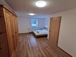 Postel nebo postele na pokoji v ubytování Müller Apartment