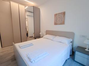 Ένα ή περισσότερα κρεβάτια σε δωμάτιο στο Casa di Bubs - By Ligooria