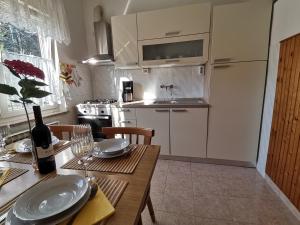 Kuchyň nebo kuchyňský kout v ubytování Apartment Grzin