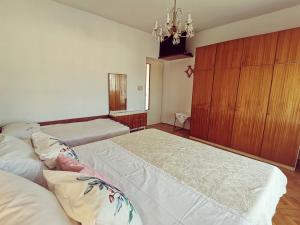 Postel nebo postele na pokoji v ubytování Apartment Grzin