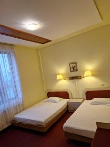 Postel nebo postele na pokoji v ubytování Casa Palace + 20 fotografií
