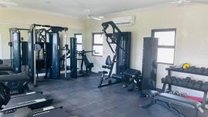 Fitness centrum a/nebo fitness zařízení v ubytování Aquamarine Resort-style Vacations
