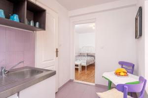 Postel nebo postele na pokoji v ubytování Harbourside Guesthouse Mandina - ZF Hvar