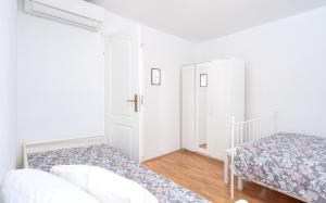 Posteľ alebo postele v izbe v ubytovaní Harbourside Guesthouse Mandina - ZF Hvar