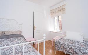Postel nebo postele na pokoji v ubytování Harbourside Guesthouse Mandina - ZF Hvar