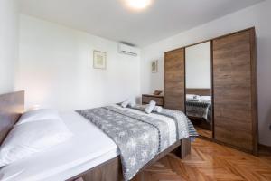 Posteľ alebo postele v izbe v ubytovaní Sea Shell Apartments