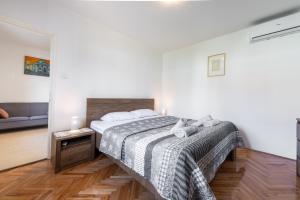 Posteľ alebo postele v izbe v ubytovaní Sea Shell Apartments