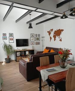 TV a/nebo společenská místnost v ubytování Entre patios y flores