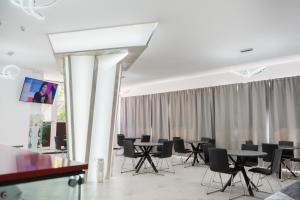 TV a/nebo společenská místnost v ubytování B&B El Dorado
