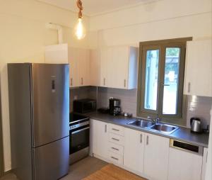 A kitchen or kitchenette at Nautilus Beach Home