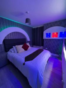 מיטה או מיטות בחדר ב-Ds Apartments