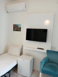 TV a/nebo společenská místnost v ubytování Daffne Otel + 37 fotografií