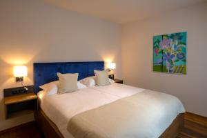 Säng eller sängar i ett rum på Resort Una Park