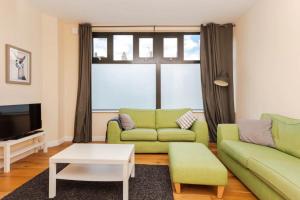 אזור ישיבה ב-Stylish 2 Bedroom Apartment in Greenwich