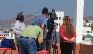a group of people standing on a roof with a camera at HOTEL REGINA in Tetouan