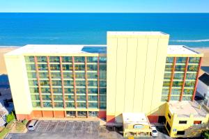 an aerial view of two buildings and the ocean at Ocean Resort in Virginia Beach