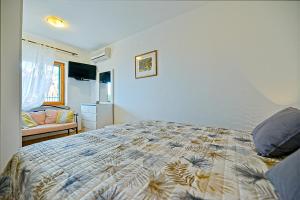 Posteľ alebo postele v izbe v ubytovaní Art Apartments Postira