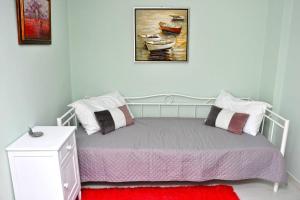 Posteľ alebo postele v izbe v ubytovaní Koukaki sunshine roof apartment