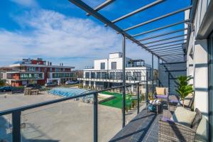 Balkón alebo terasa v ubytovaní Grey Lights Garden Apartment