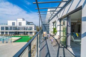 Balkón alebo terasa v ubytovaní Grey Lights Garden Apartment