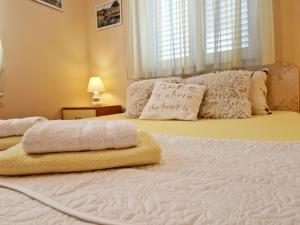 Posteľ alebo postele v izbe v ubytovaní Apartment 3 Sisters