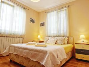 Posteľ alebo postele v izbe v ubytovaní Apartment 3 Sisters