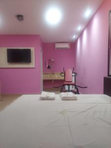 Et tv og/eller underholdning på Vélox Motéis