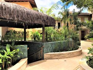 En have udenfor CASA na Praia PERFEITA DE JUQUEHY