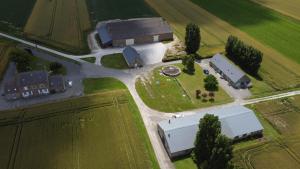 an aerial view of a farm with a building at Gite Couesnon in Roz-sur-Couesnon