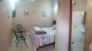 Gulta vai gultas numurā naktsmītnē Hospedaje Encarnación