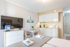 Kuchnia lub aneks kuchenny w obiekcie Ambria Apartments Promenada