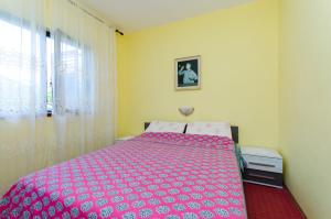 Posteľ alebo postele v izbe v ubytovaní Apartments Tugomila