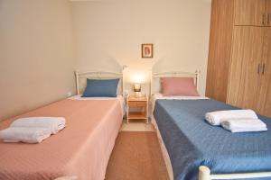 Postel nebo postele na pokoji v ubytování Casa Contessa in Garitsa - High Speed Wifi