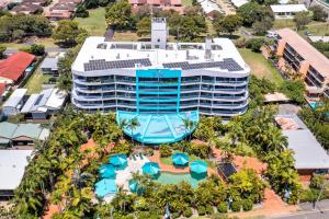 a large building with a lot of windows at Riviera Resort in Hervey Bay