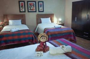Llit o llits en una habitació de Eco Aventura Hostel Cusco