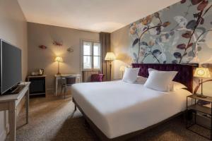 Кровать или кровати в номере Best Western Plus d'Europe et d'Angleterre