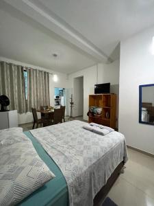 Katil atau katil-katil dalam bilik di Hospedagem Elite térreo +53 gambar