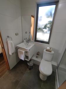 Ванная комната в Hotel Le Petit