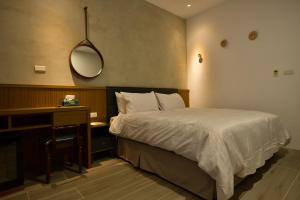 Katil atau katil-katil dalam bilik di An-Ping Inn Here
