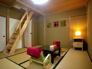 Postel nebo postele na pokoji v ubytování B&B Koyuki Hakuba