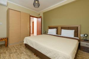 Posteľ alebo postele v izbe v ubytovaní Fani's Beach House