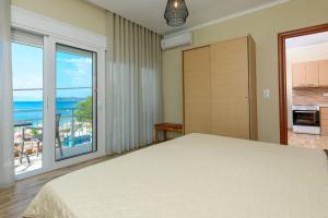 Posteľ alebo postele v izbe v ubytovaní Fani's Beach House