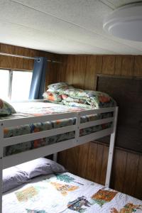 Postel nebo postele na pokoji v ubytování Denali RV Park & Motel