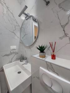 Kúpeľňa v ubytovaní Zoxi apartmani